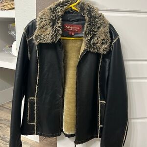 Faux leather and fur, but very warm!